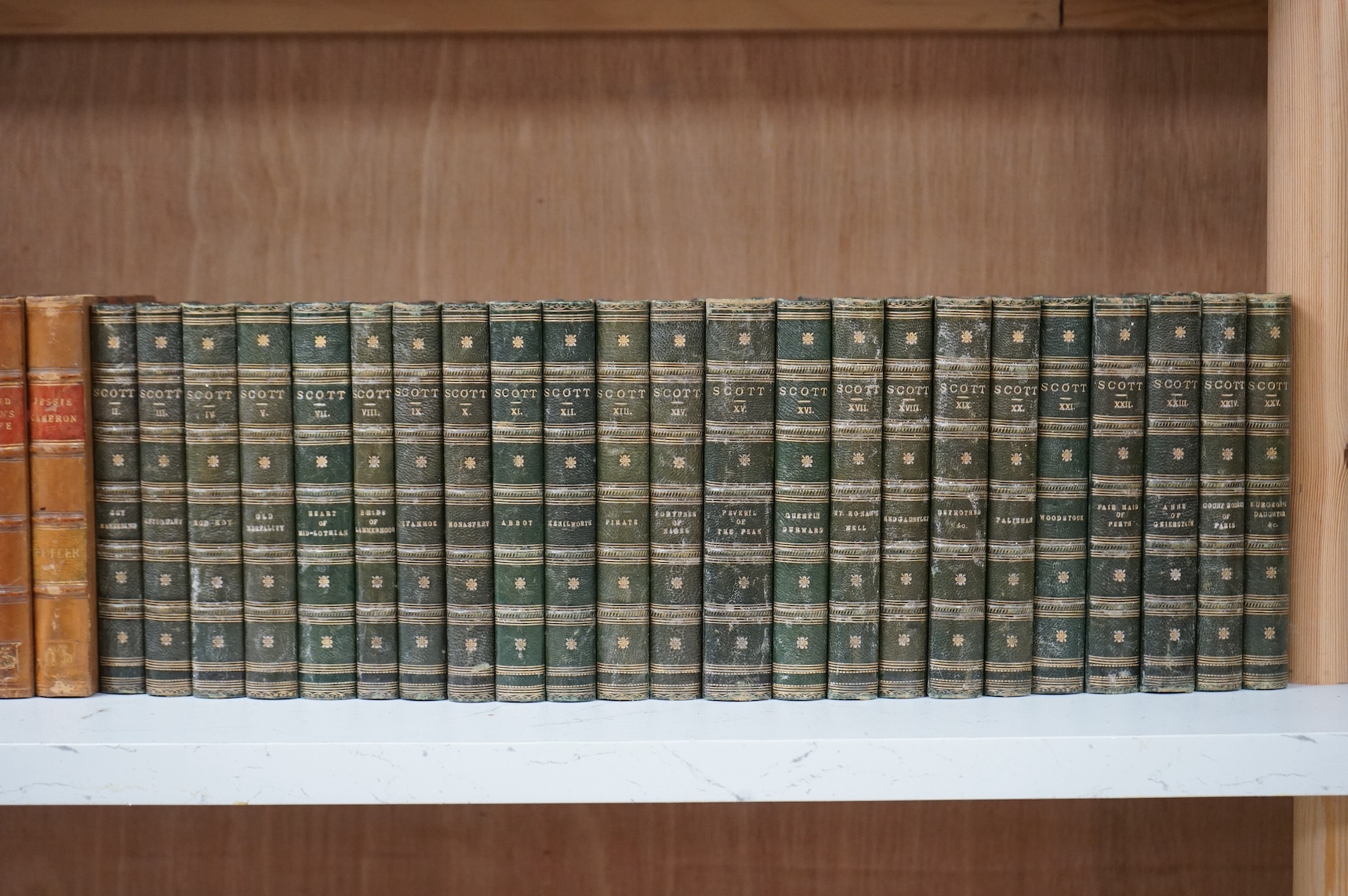 A collection of approximately seventy 19th century and later mixed leather bound books to include Charles Dickens and Rudyard Kipling. Condition - fair to good